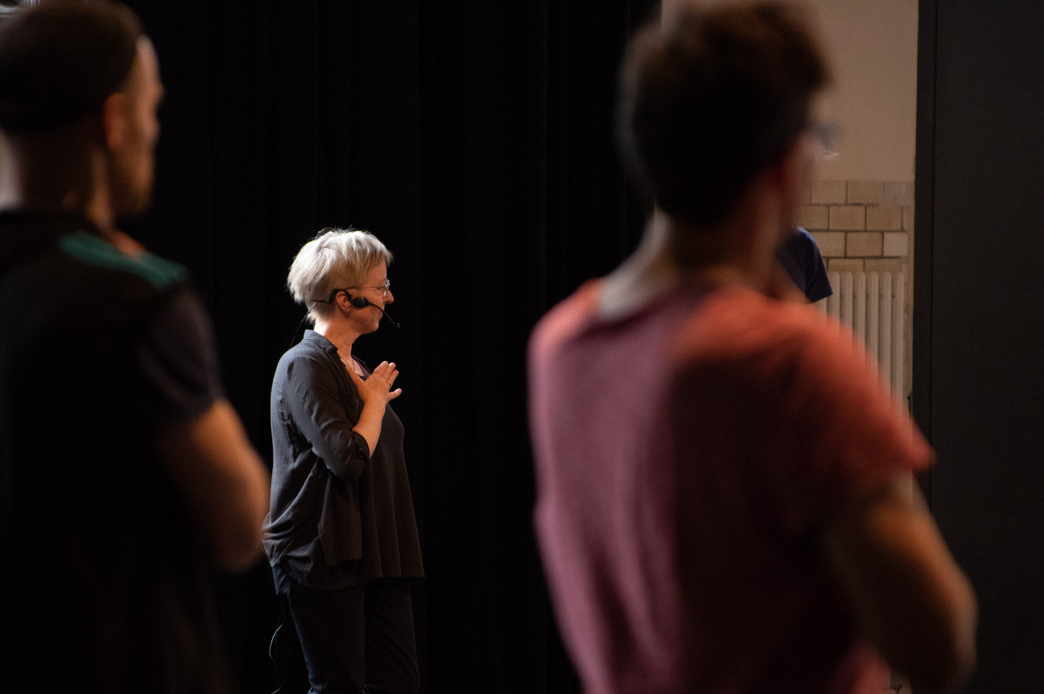 Image of people standing in a workshop